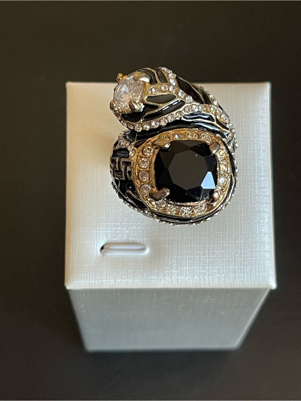 Gold tone Black enamel and rhinestone statement ring.